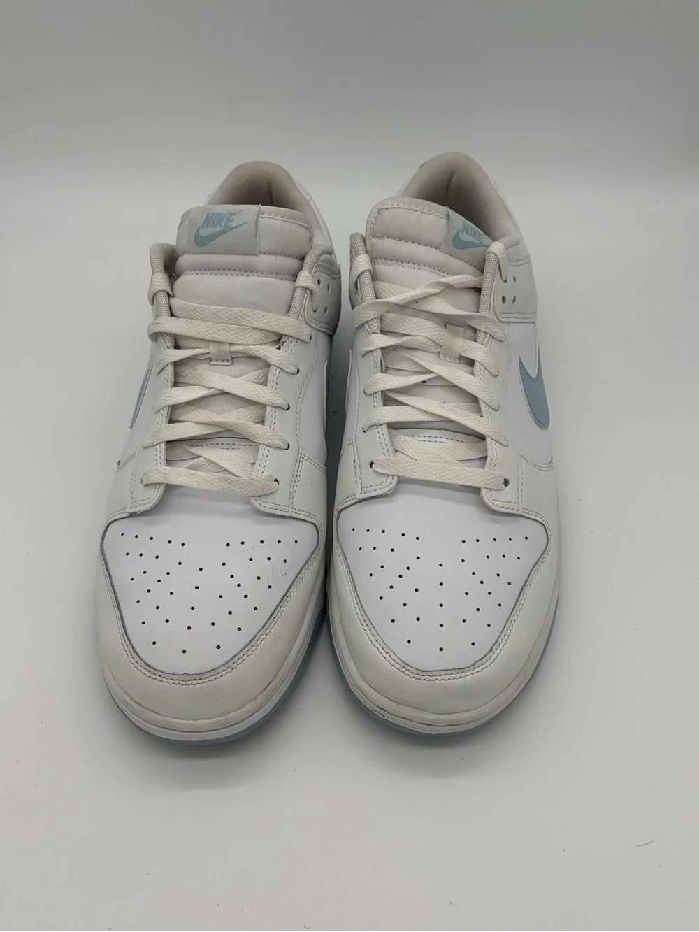 Nike Dunks Men’s Low-Top Sneakers in White with Light Blue Swoosh